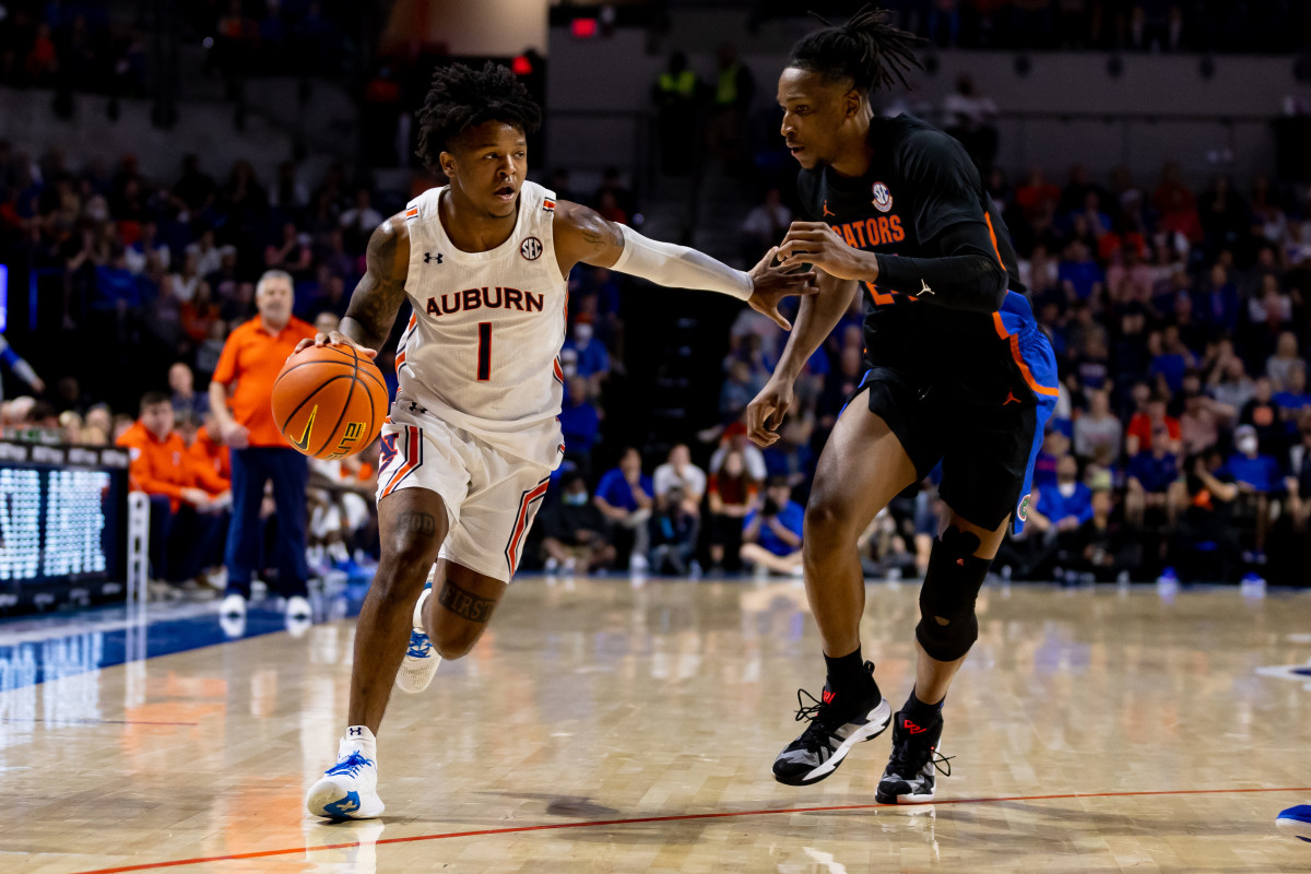 Feb 19, 2022; Gainesville, Florida, USA; Auburn Tigers guard Wendell Green Jr. (1) drives to the basket during the first half against the Florida Gators at Billy Donovan Court at Exactech Arena. Mandatory Credit: Matt Pendleton-USA TODAY Sports