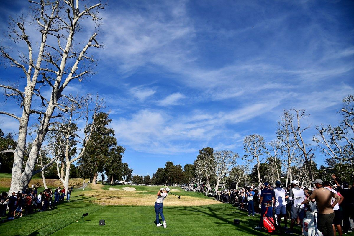 Collin Morikawa hits a tee shot at Riviera