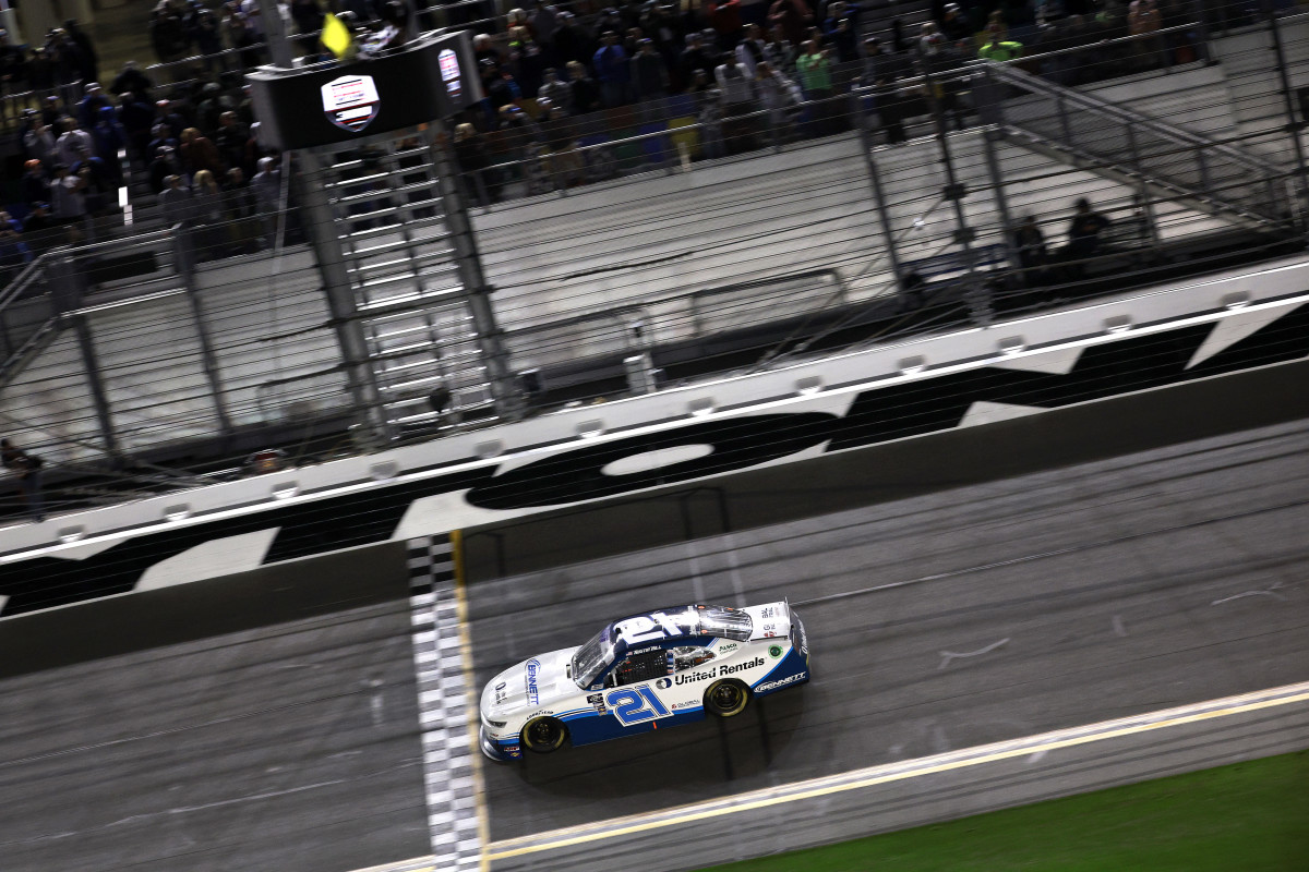 Austin Hill crosses the finish line under caution to win the NASCAR Xfinity Series Beef. It's What's For Dinner. 300 Saturday. (Photo by Jared C. Tilton/Getty Images)
