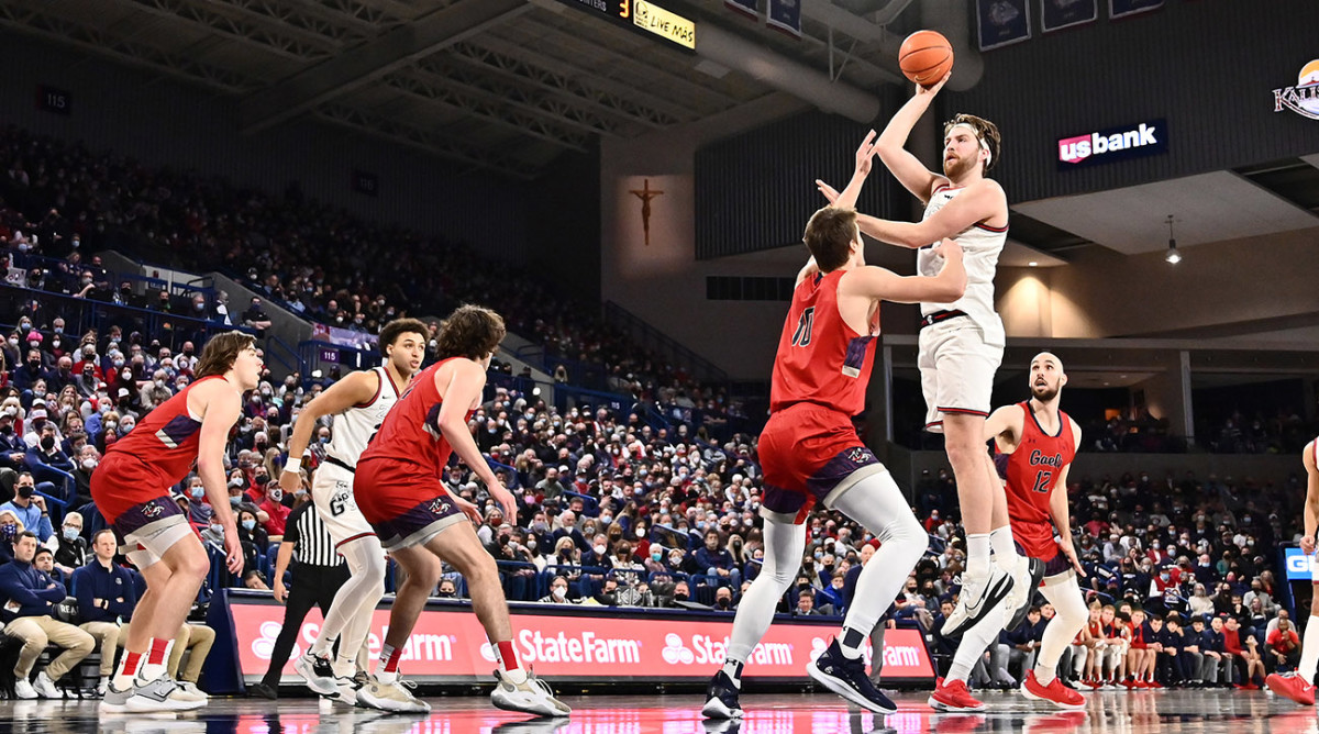 Gonzaga forward Drew Timme (2) shoots the ball against St. Mary's center Mitchell Saxen (10).