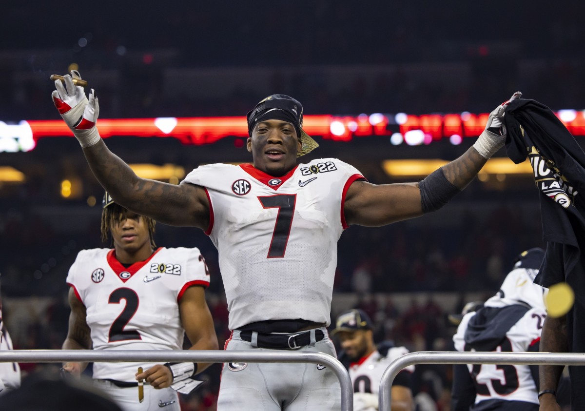 Jan 10, 2022; Indianapolis, IN, USA; Georgia Bulldogs linebacker Quay Walker (7) celebrates after defeating the Alabama Crimson Tide in the 2022 CFP college football national championship game at Lucas Oil Stadium.