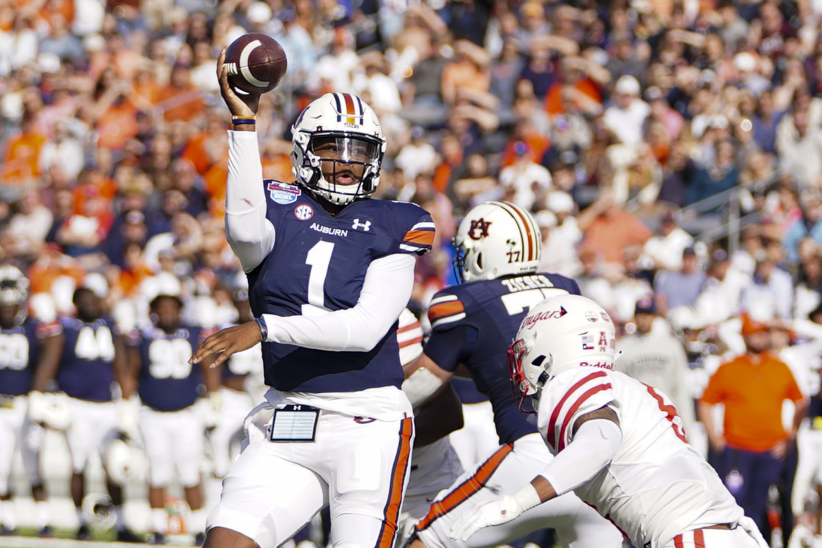 Dec 28, 2021; Birmingham, Alabama, USA; Auburn Tigers quarterback TJ Finley (1) passes against the Houston Cougars during the second half of the 2021 Birmingham Bowl at Protective Stadium. Mandatory Credit: Marvin Gentry-USA TODAY Sports