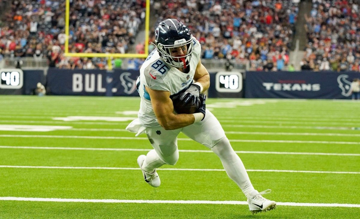 Tennessee Titans tight end Anthony Firkser (86) runs the ball in for a touchdown during the second quarter against the Houston Texans at NRG Stadium.