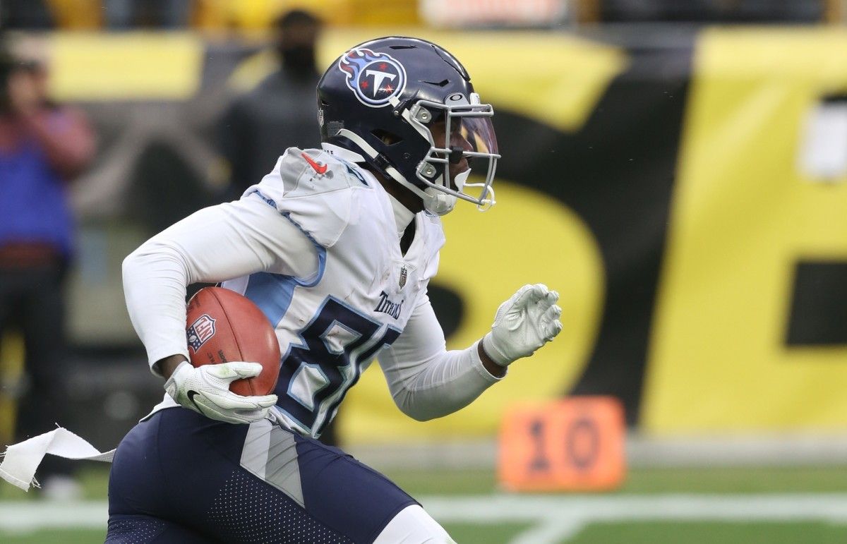 Tennessee Titans wide receiver Chester Rogers (80) returns a kick-off against the Pittsburgh Steelers during the third quarter at Heinz Field.