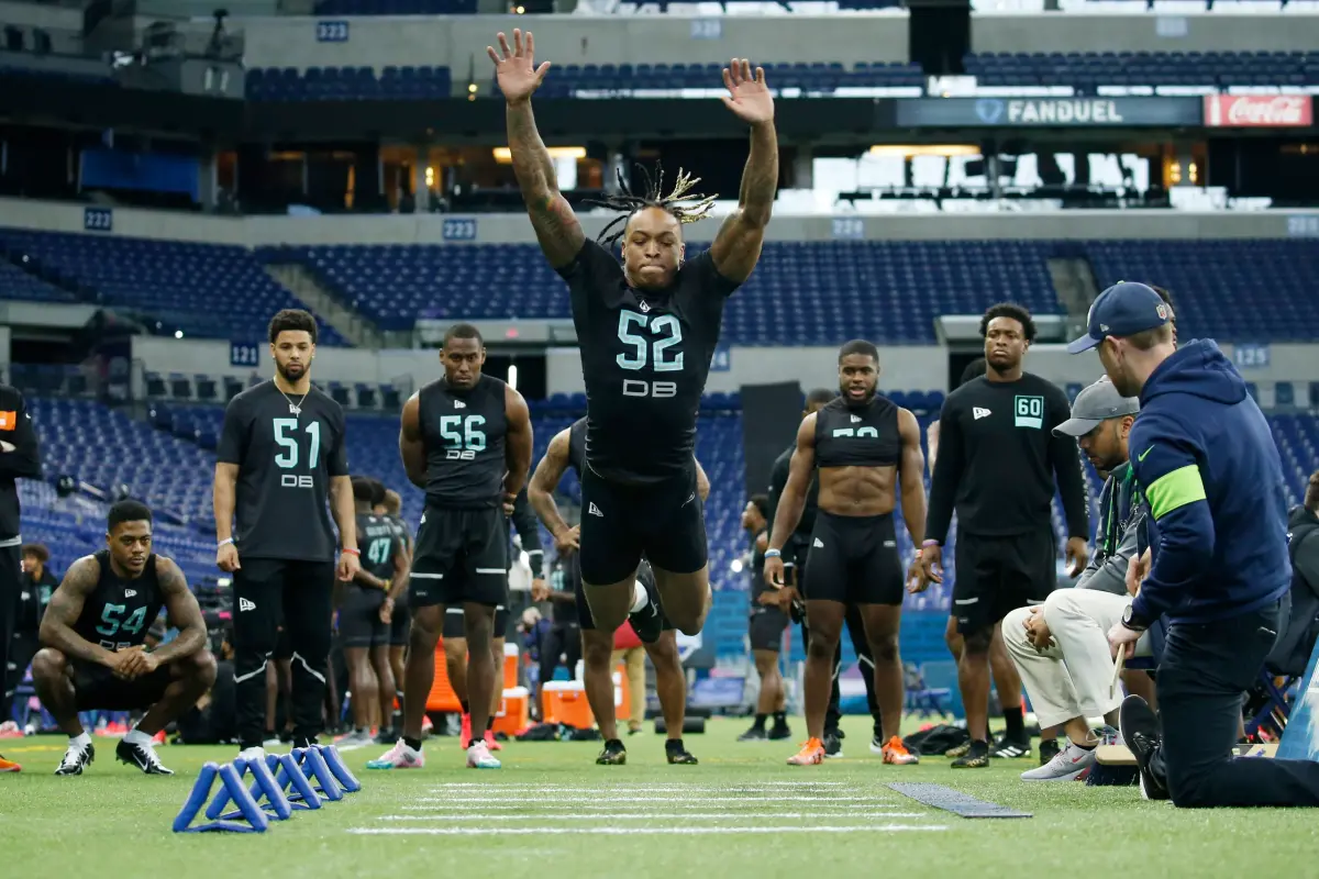 Alabama Crimson Tide defensive back Xavier McKinney (DB52) does the broad jump during the 2020 NFL Combine at Lucas Oil Stadium.