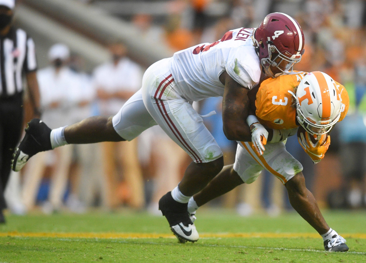 Tennessee running back Eric Gray (3) is tackled by Alabama linebacker Christopher Allen (4) in the fourth quarter in the second half during a game between Alabama and Tennessee at Neyland Stadium in Knoxville, Tenn. on Saturday, Oct. 24, 2020.