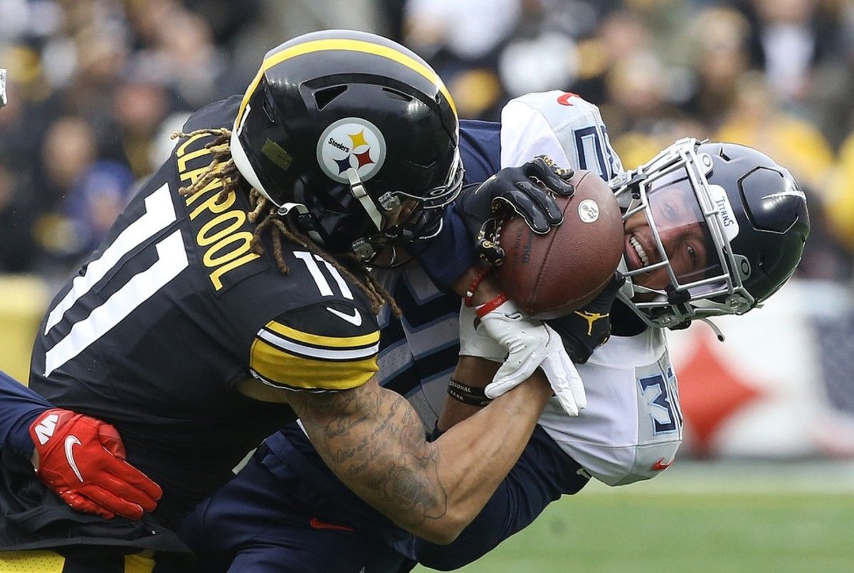 Tennessee Titans cornerback Greg Mabin (30) breaks up a pass intended for Pittsburgh Steelers wide receiver Chase Claypool (11) during the first quarter at Heinz Field.