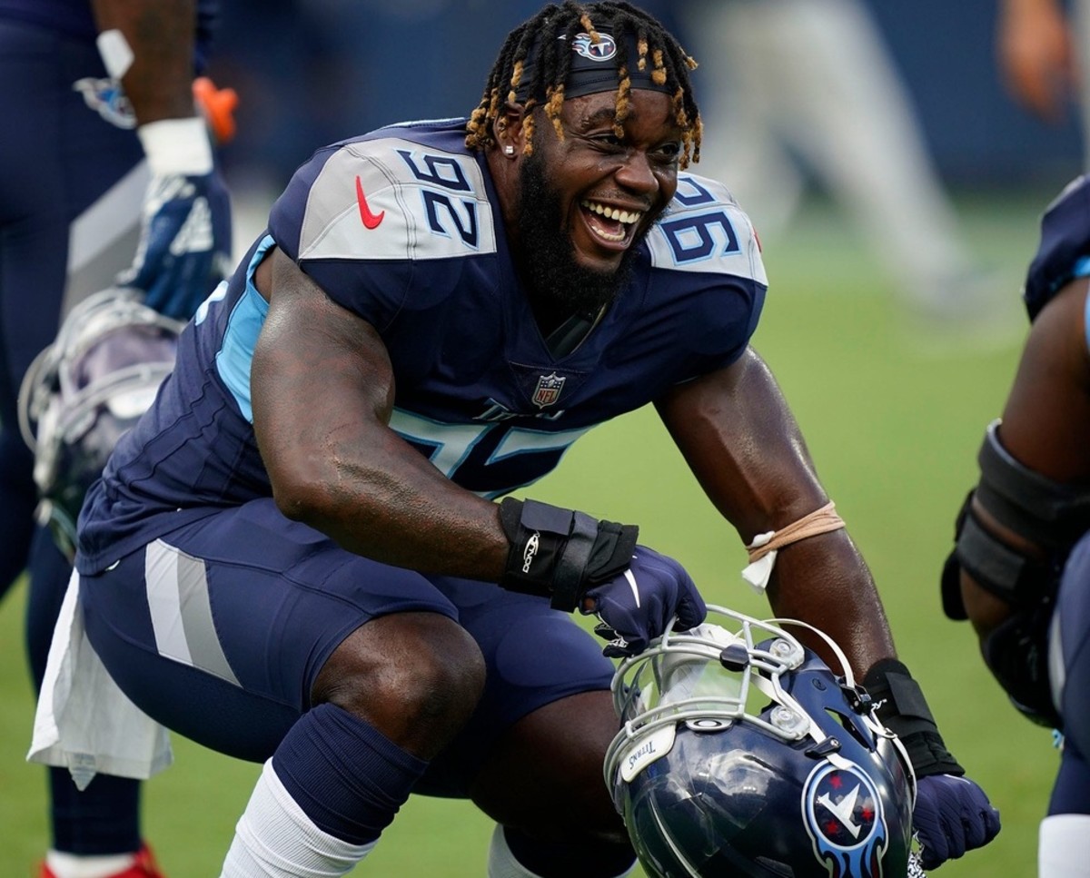Tennessee Titans outside linebacker Ola Adeniyi (92) dances during warmups before they face the Bears at Nissan Stadium Saturday, Aug. 28, 2021 in Nashville, Tenn.
