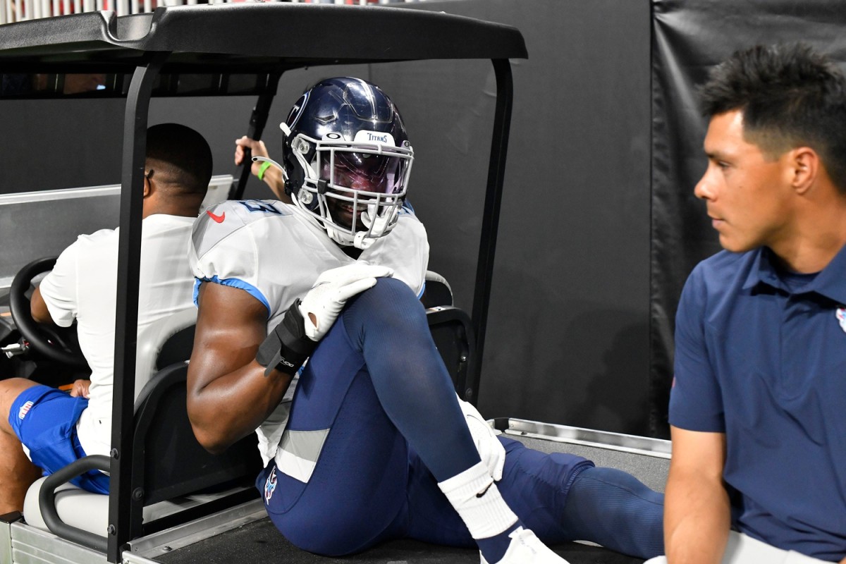 Tennessee Titans linebacker B.J. Bello (53) is taken off the field after getting injured during a preseason game at Mercedes-Benz Stadium Friday, Aug. 13, 2021 in Atlanta, Ga.