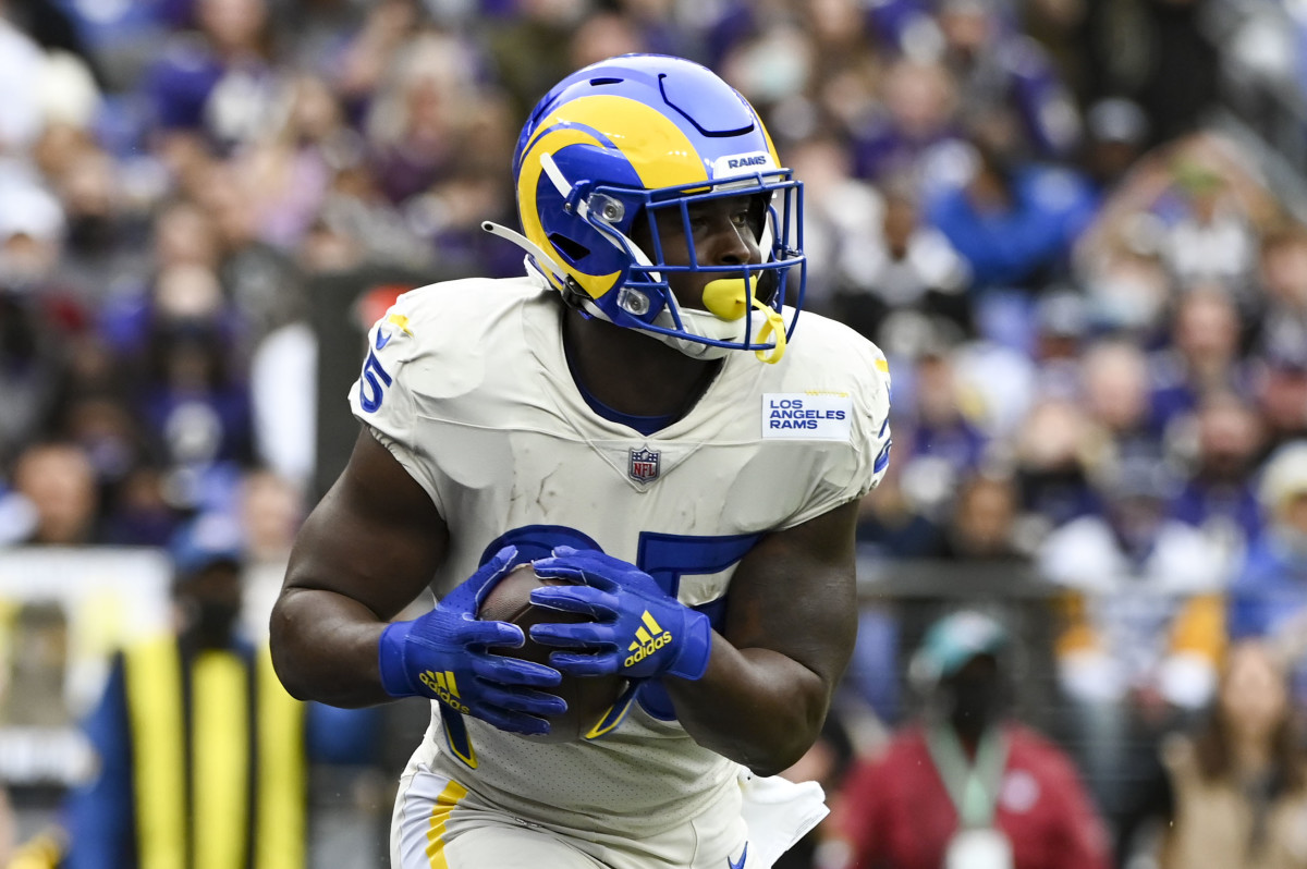 Jan 2, 2022; Baltimore, Maryland, USA; Los Angeles Rams running back Sony Michel (25) rushes during the first half against the Baltimore Ravens at M&T Bank Stadium. Mandatory Credit: Tommy Gilligan-USA TODAY Sports