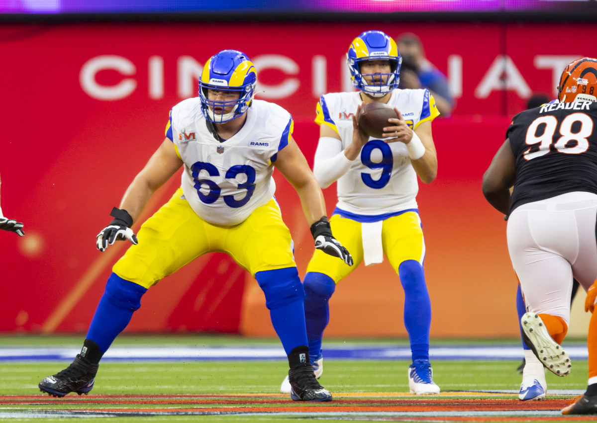 Feb 13, 2022; Inglewood, CA, USA; Los Angeles Rams center Austin Corbett (63) blocks for quarterback Matthew Stafford (9) against the Cincinnati Bengals in Super Bowl LVI at SoFi Stadium. Mandatory Credit: Mark J. Rebilas-USA TODAY Sports