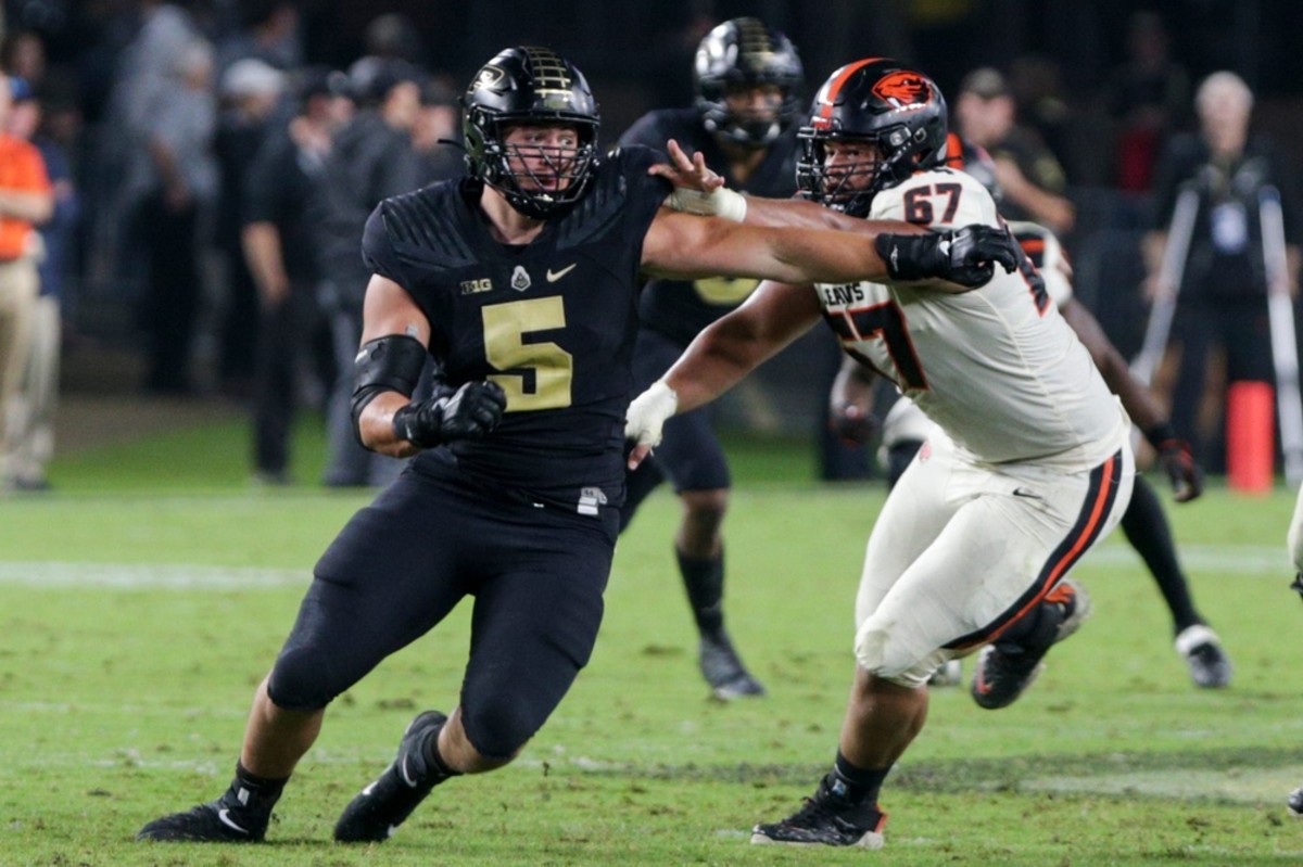 Purdue defensive end George Karlaftis (5) evades Oregon State offensive lineman Joshua Gray (67) during the fourth quarter of an NCAA college football game, Saturday, Sept. 4, 2021 at Ross-Ade Stadium in West Lafayette. Cfb Purdue Vs Oregon State