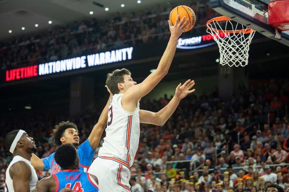 Auburn Tigers forward Walker Kessler (13) goes up for a layup as Auburn Tigers take on Mississippi Rebels at Auburn Arena in Auburn, Ala., on Wednesday, Feb. 23, 2022.