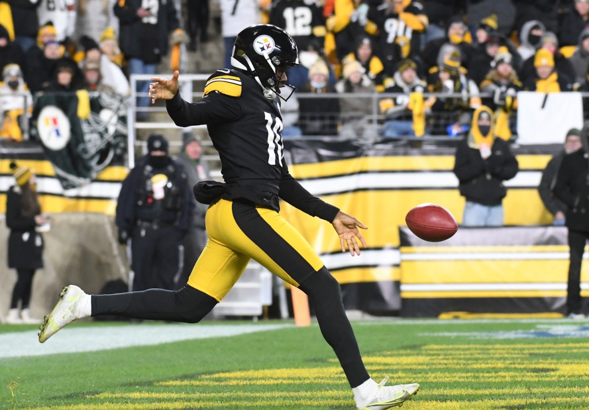 Pittsburgh Steelers punter Corliss Waitman (10) kicks the ball against the Cleveland Browns during the third quarter at Heinz Field.