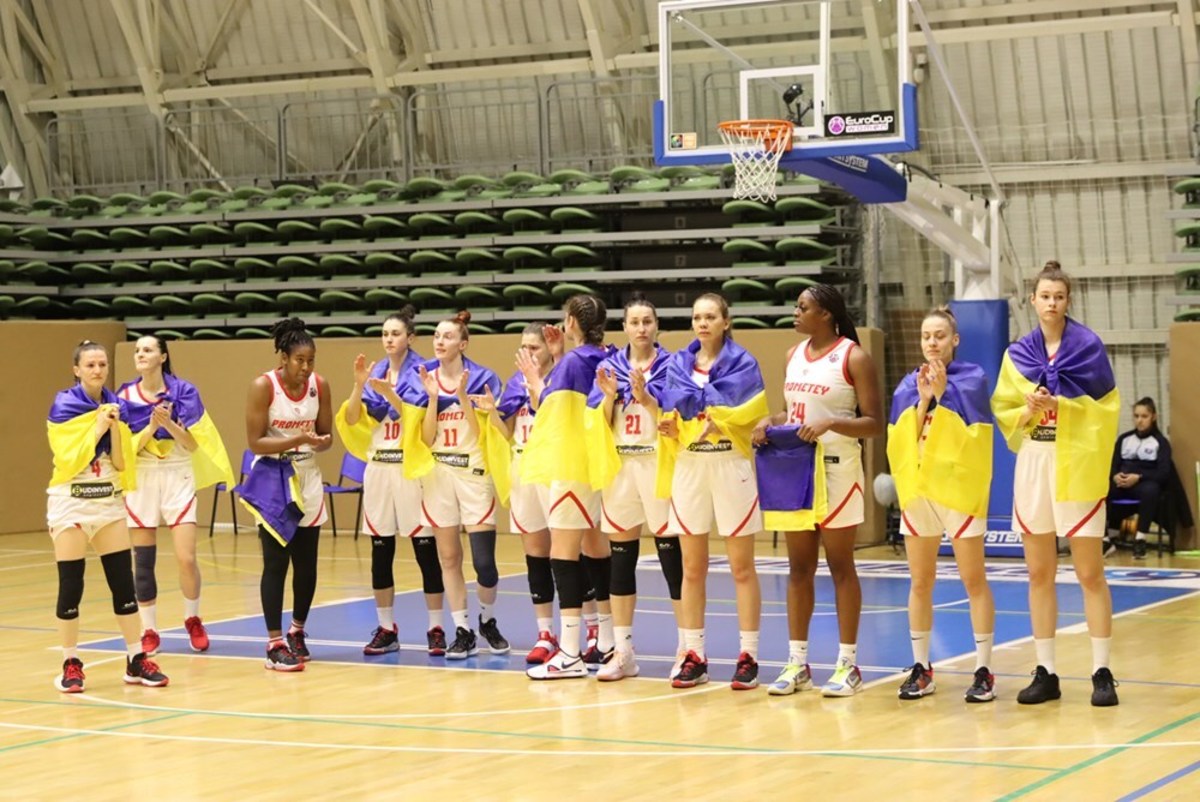 BC Prometey players drape themselves in Ukrainian flags before a recent game in Bulgaria on Feb. 24.