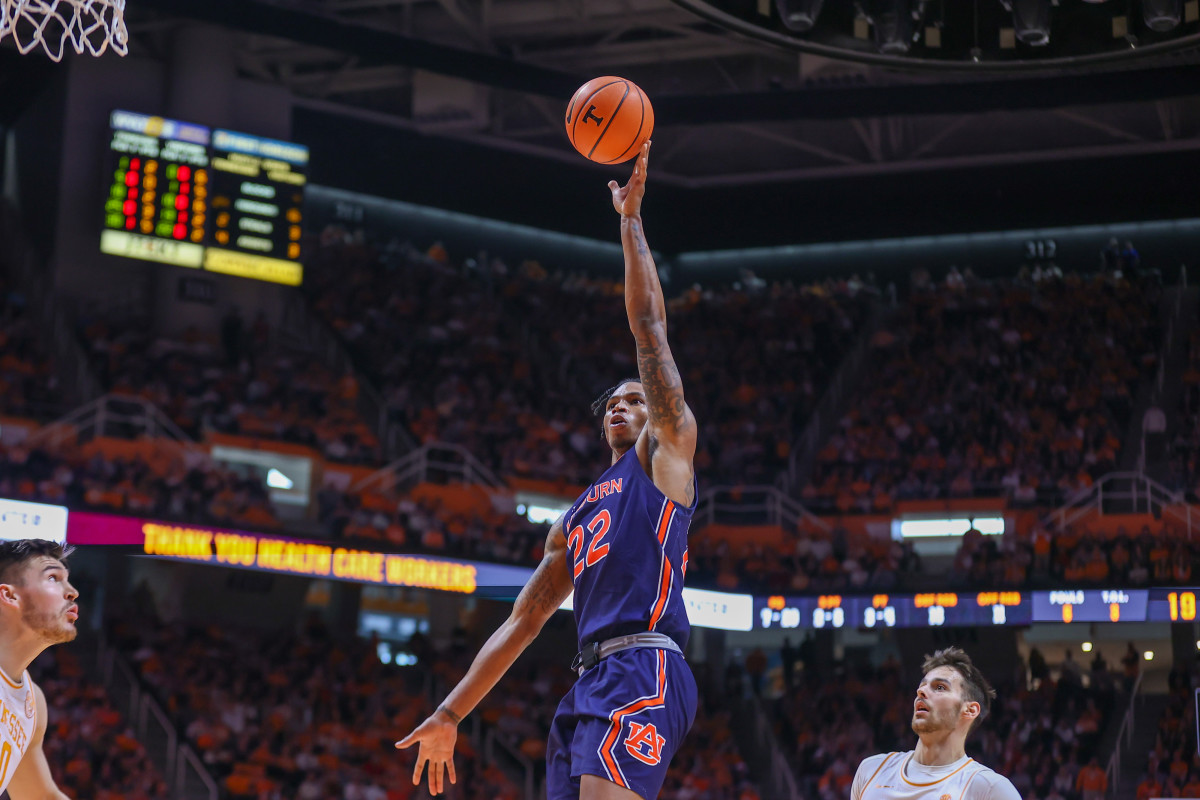 Feb 26, 2022; Knoxville, Tennessee, USA; Auburn Tigers guard Allen Flanigan (22) goes to the basket against the Tennessee Volunteers during the first half at Thompson-Boling Arena. Mandatory Credit: Randy Sartin-USA TODAY Sports