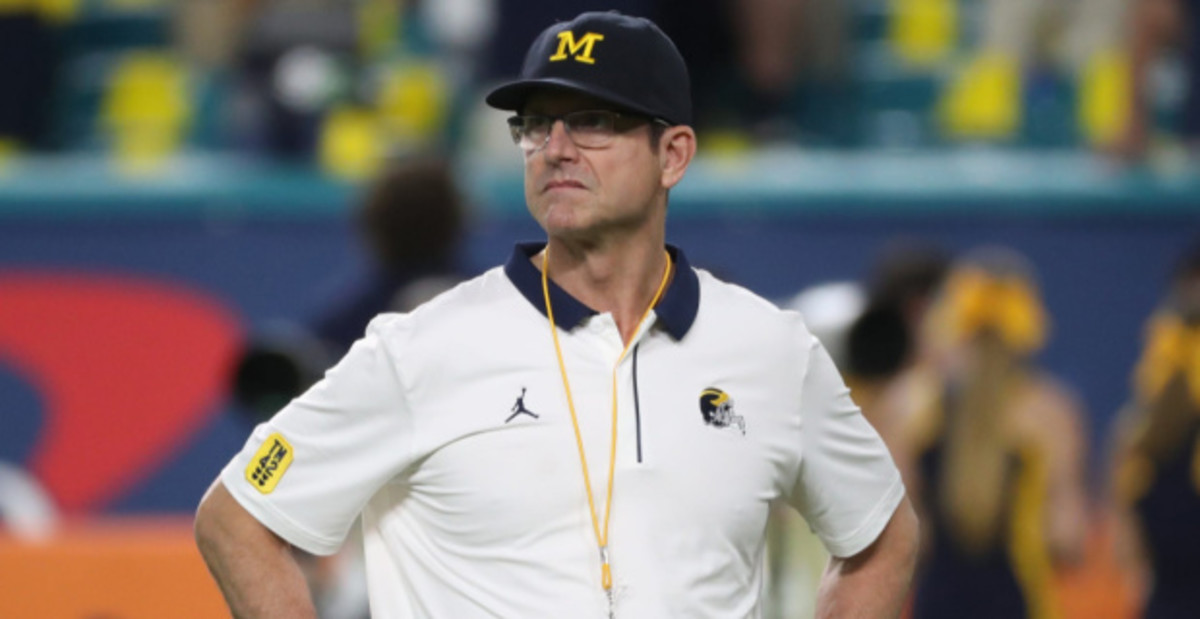 Michigan football coach Jim Harbaugh led the Wolverines to a No. 2 spot in the College Football Playoff rankings in 2021.
