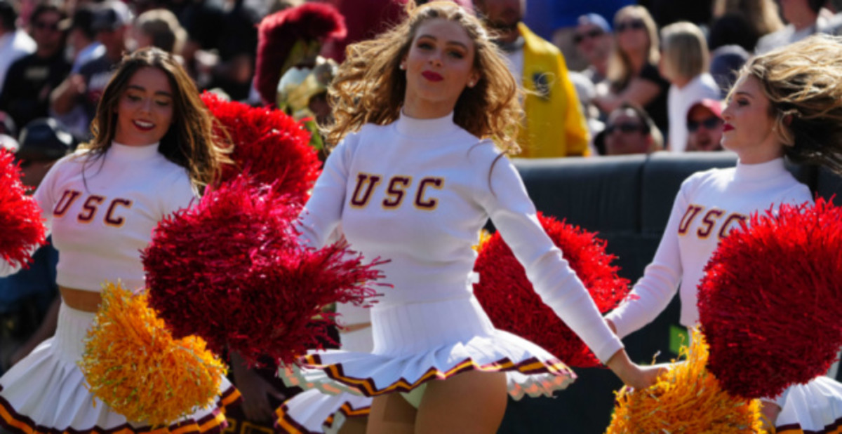 Scenes at a college football game featuring the USC Trojans.