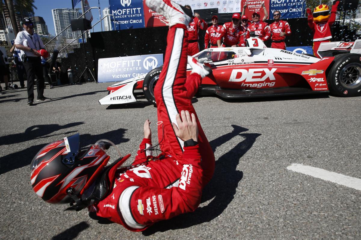 McLaughlin was so excited about the win that he inadvertently fell after climbing out of his race car. Photo: IndyCar