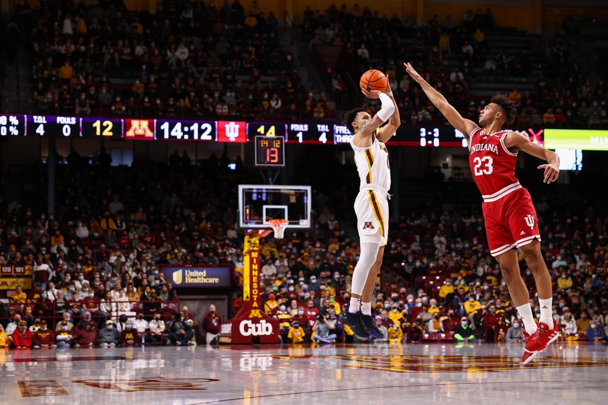 Minnesota guard Payton Willis (0) shoots the ball over Indiana forward Trayce Jackson-Davis (23) despite being well defended. Willis hit seven three-pointers. (Harrison Barden/USA TODAY Sports)