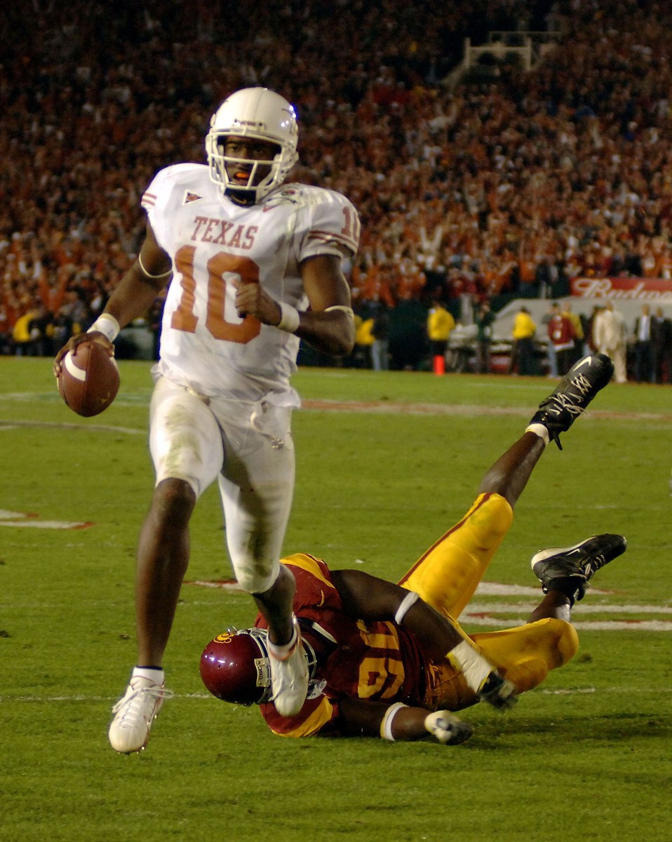 Jan 4, 2006; Pasadena, CA, USA; Texas Longhorns quarterback (10) Vince Young scores the game winning touchdown during the 4th quarter against the Southern California Trojans in the Rose Bowl Game at the Rose Bowl in Pasadena, California. Texas Longhorns defeated the Trojans 41-38.