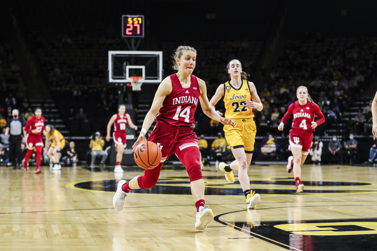Ali Patberg dribbles down the court in the Indiana versus Iowa matchup.