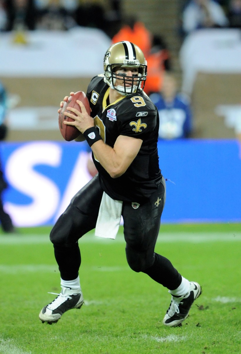 Oct. 26, 2008; London, ENGLAND; Saints quarterback Drew Brees (9) scrambles during a NFL International Series game against the San Diego Chargers. Mandatory Credit: Kyle Terada-USA TODAY Sports