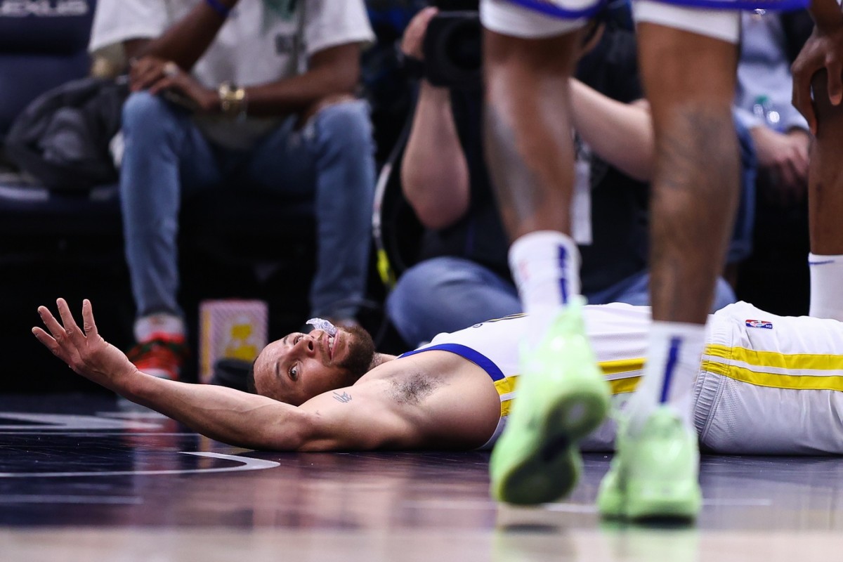 Mar 1, 2022; Minneapolis, Minnesota, USA; Golden State Warriors guard Stephen Curry (30) reacts after a play against the Minnesota Timberwolves during the third quarter at Target Center. Mandatory Credit: Harrison Barden-USA TODAY Sports