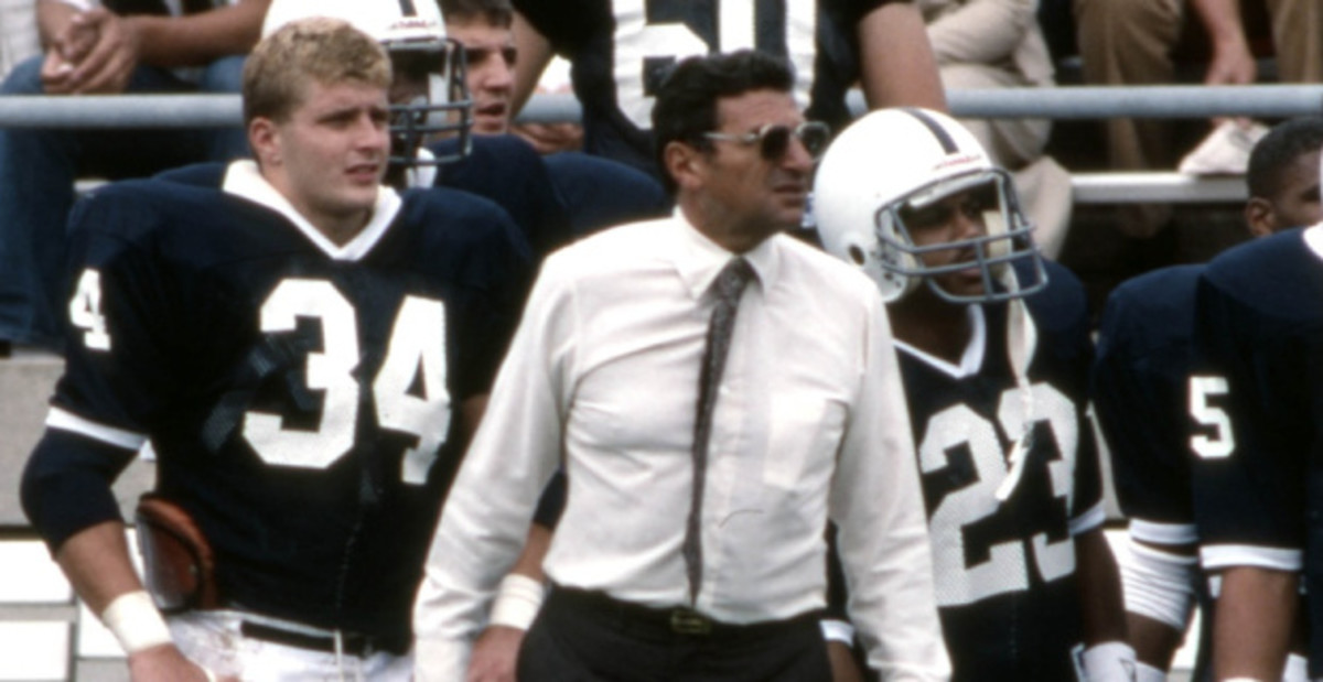 Penn State Nittany Lions head coach Joe Paterno on the sideline during a college football game.