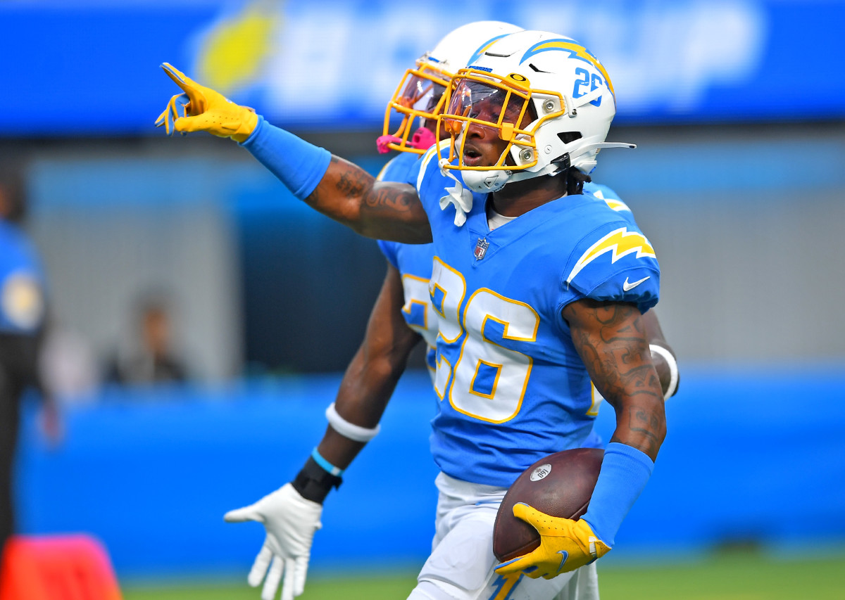 Aug 22, 2021; Inglewood, California, USA; Los Angeles Chargers cornerback Asante Samuel Jr. (26) celebrated after he intercepted a pass intended for San Francisco 49ers wide receiver Brandon Aiyuk (11) in the first half of the game at SoFi Stadium. Mandatory Credit: Jayne Kamin-Oncea-USA TODAY Sports