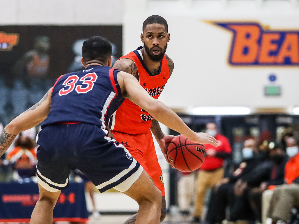 Seventh Woods dribbles while at Morgan State