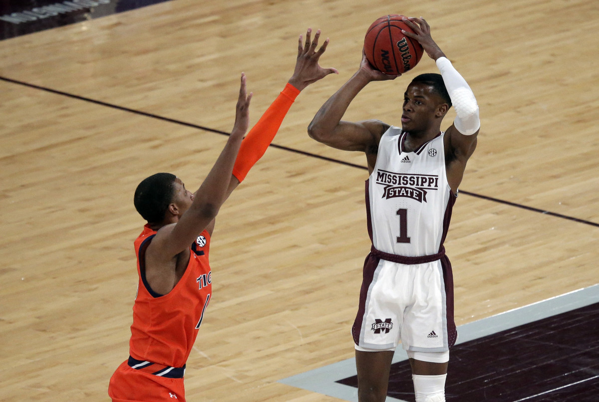 Mar 2, 2022; Starkville, Mississippi, USA; Mississippi State Bulldogs guard Iverson Molinar (1) attempts a three-point shot as Auburn Tigers forward Jabari Smith (10) defends during the first half at Humphrey Coliseum. Mandatory Credit: Petre Thomas-USA TODAY Sports