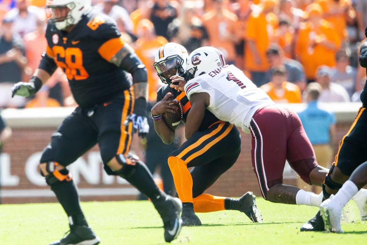 Tennessee quarterback Hendon Hooker (5) is sacked by South Carolina edge rusher Kingsley Enagbare (1) during a NCAA football game between the Tennessee Volunteers and the South Carolina Gamecocks at Neyland Stadium in Knoxville, Tenn. on Saturday, Oct. 9, 2021. Kns Tennessee South Carolina Football Bp