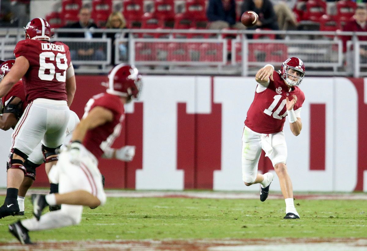 Alabama quarterback Mac Jones (10) throws a pass to Alabama wide receiver Slade Bolden (18) against Mississippi State at Bryant-Denny Stadium.