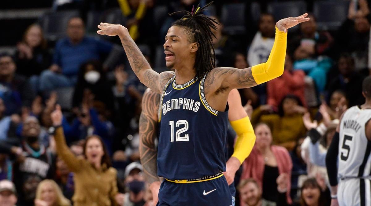 Memphis Grizzlies guard Ja Morant reacts during the first half of the team's NBA basketball game against the San Antonio Spurs on Monday, Feb. 28, 2022, in Memphis, Tenn