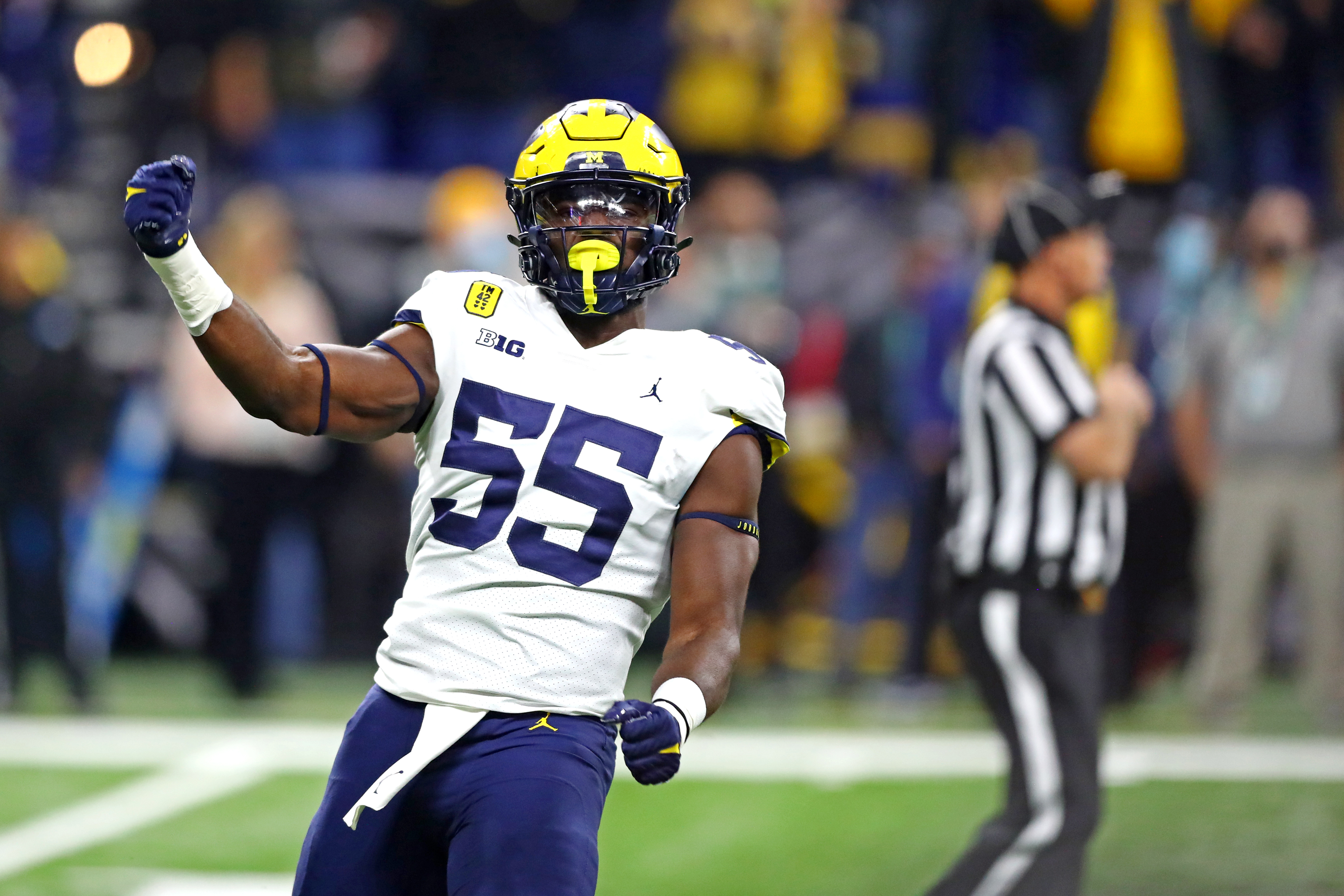 Dec 4, 2021; Indianapolis, IN, USA; Michigan Wolverines linebacker David Ojabo (55) reacts during the first quarter against the Iowa Hawkeyes in the Big Ten Conference championship game at Lucas Oil Stadium. Mandatory Credit: Mark J. Rebilas-USA TODAY Sports