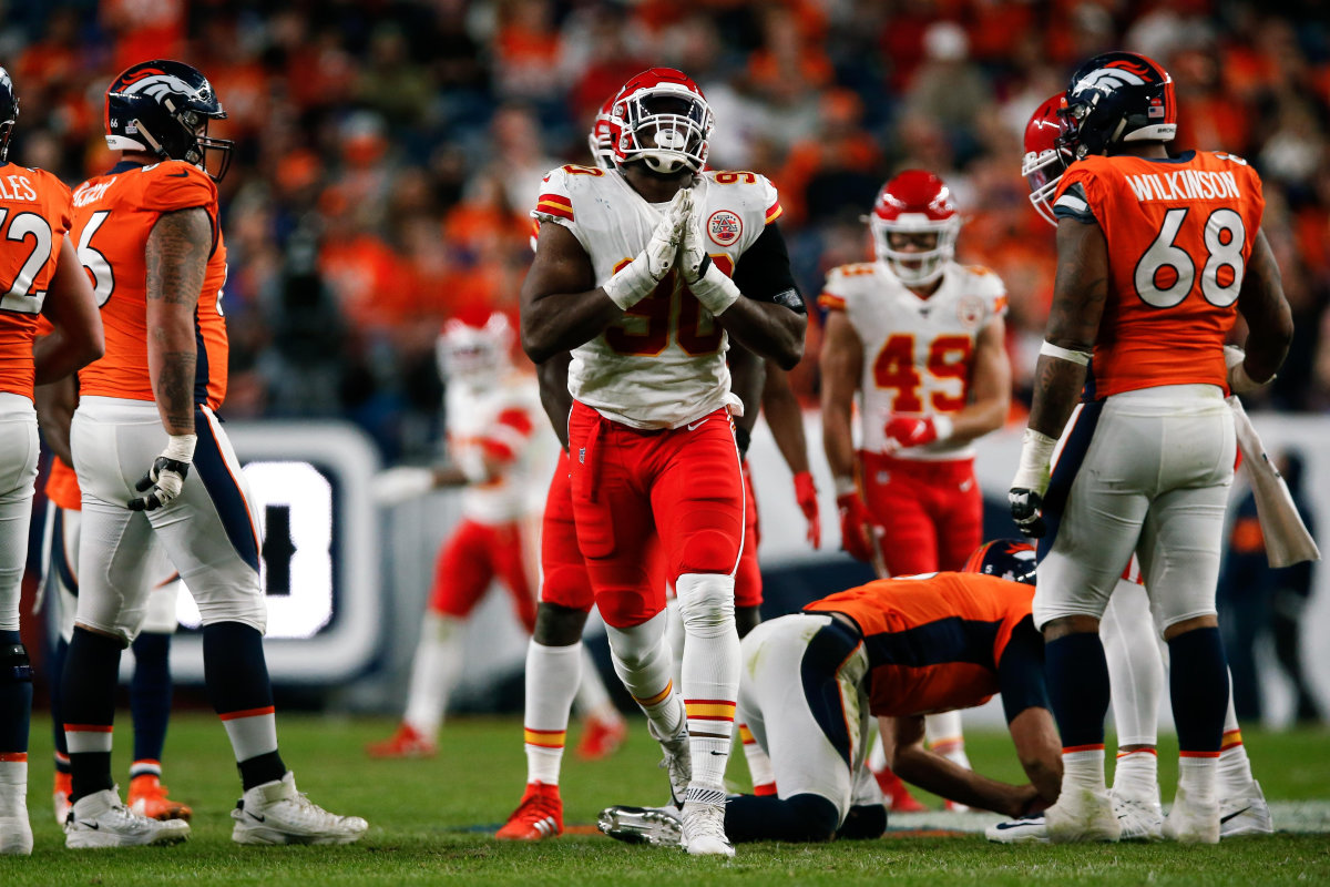 Oct 17, 2019; Denver, CO, USA; Kansas City Chiefs defensive end Emmanuel Ogbah (90) reacts after sacking Denver Broncos quarterback Joe Flacco (5) in the third quarter at Empower Field at Mile High. Mandatory Credit: Isaiah J. Downing-USA TODAY Sports
