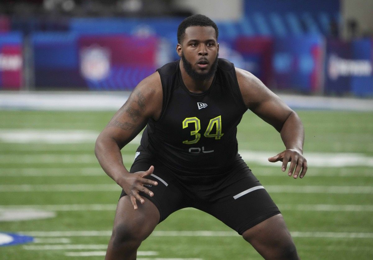 Ohio State offensive lineman Thayer Munford Jr (OL34) goes through drills during the 2022 NFL Scouting Combine at Lucas Oil Stadium.