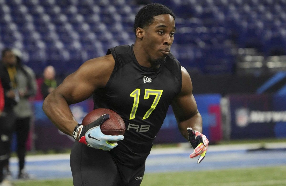 Iowa State running back Breece Hall (RB17) goes through drills during the 2022 NFL Scouting Combine at Lucas Oil Stadium.