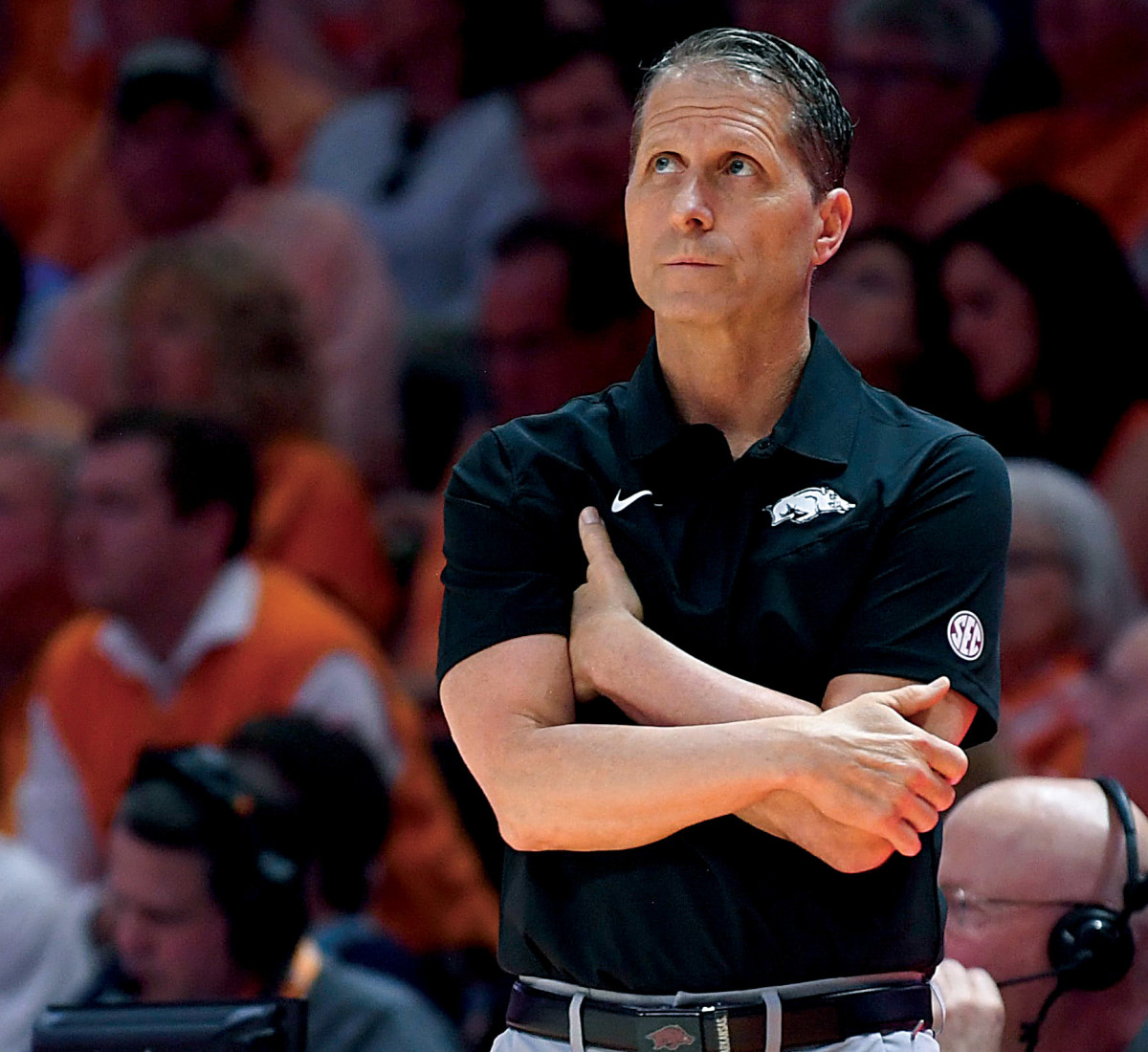 Arkansas head coach Eric Musselman stands on the sidelines during the final regular season game between Tennessee and Arkansas at Thompson-Boling Arena in Knoxville.