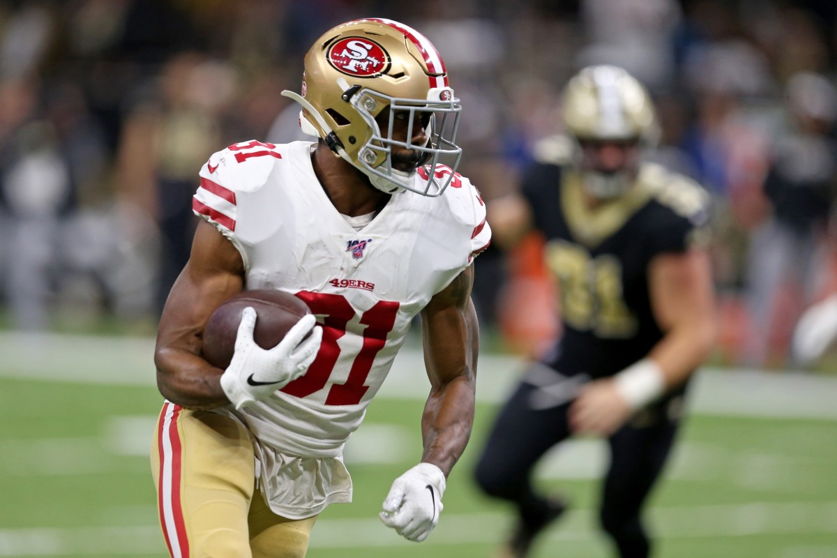 49ers running back Raheem Mostert (31) carries the ball against the New Orleans Saints. Mandatory Credit: Chuck Cook-USA TODAY Sports