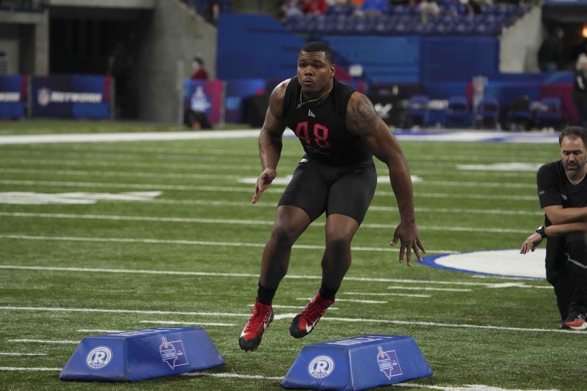 Mar 5, 2022; Indianapolis, IN, USA; Georgia defensive lineman Travon Walker (DL48) goes through drills during the 2022 NFL Scouting Combine at Lucas Oil Stadium.