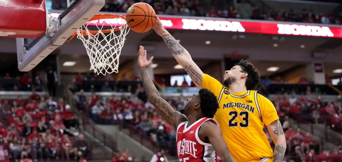 Michigan's Brandon Johns blocks a shot during the Wolverines' upset win at Ohio State on Sunday. (USA TODAY Sports)