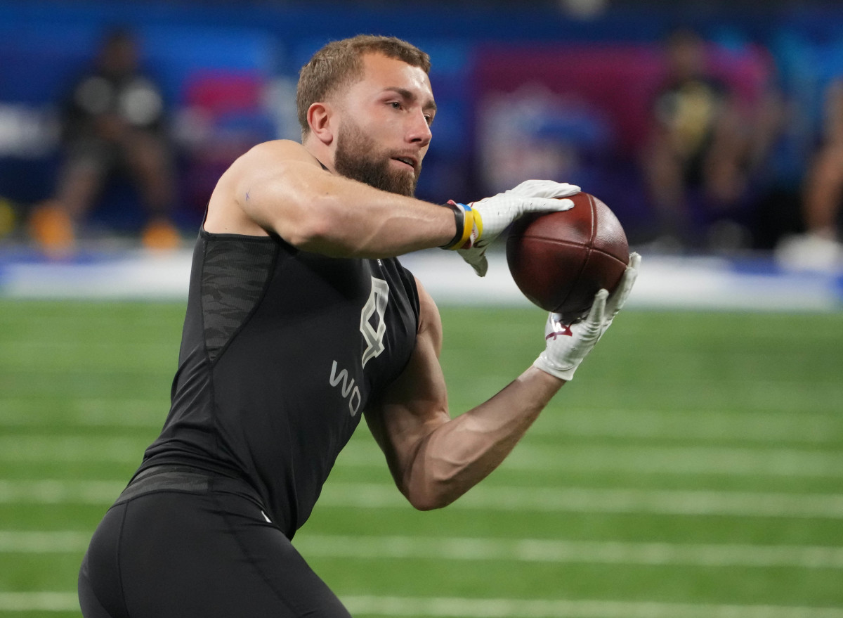 Alabama wide receiver Slade Bolden (WO04) goes through drills during the 2022 NFL Scouting Combine at Lucas Oil Stadium.