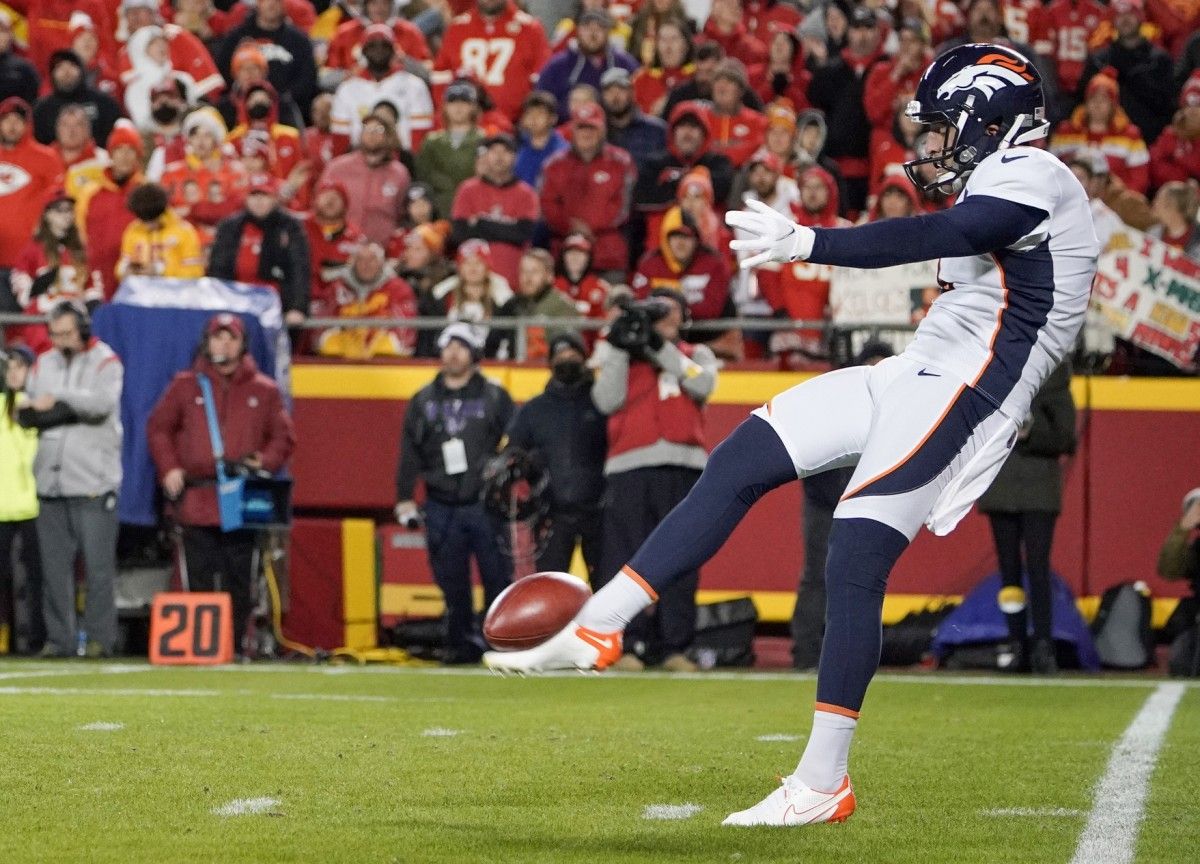 Denver Broncos punter Sam Martin (6) punts the ball against the Kansas City Chiefs during the game at GEHA Field at Arrowhead Stadium.