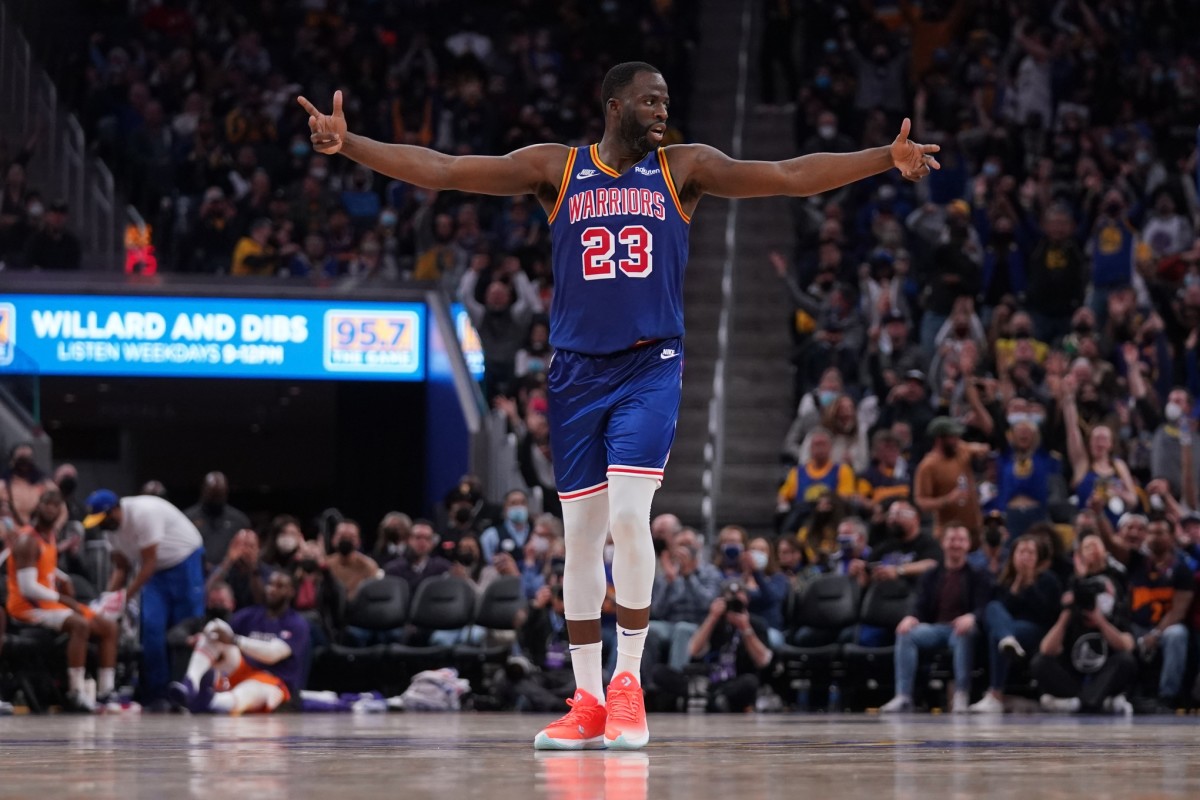 Dec 3, 2021; San Francisco, California, USA; Golden State Warriors forward Draymond Green (23) raises his arms after the Warriors made a three point basket against the Phoenix Suns in the fourth quarter at the Chase Center. Mandatory Credit: Cary Edmondson-USA TODAY Sports