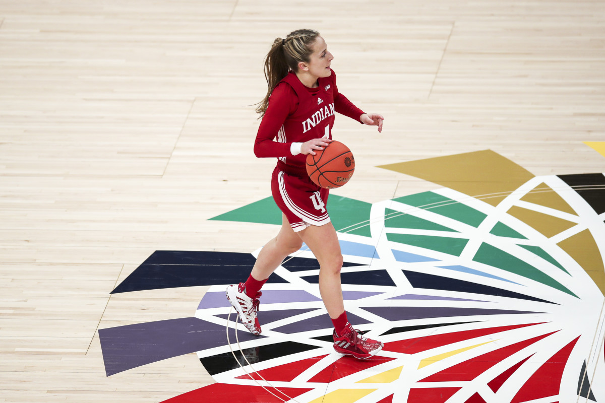 Nicole Cardaño-Hillary dribbles the ball down the court in Indiana's Big Ten Tournament matchup versus Iowa.