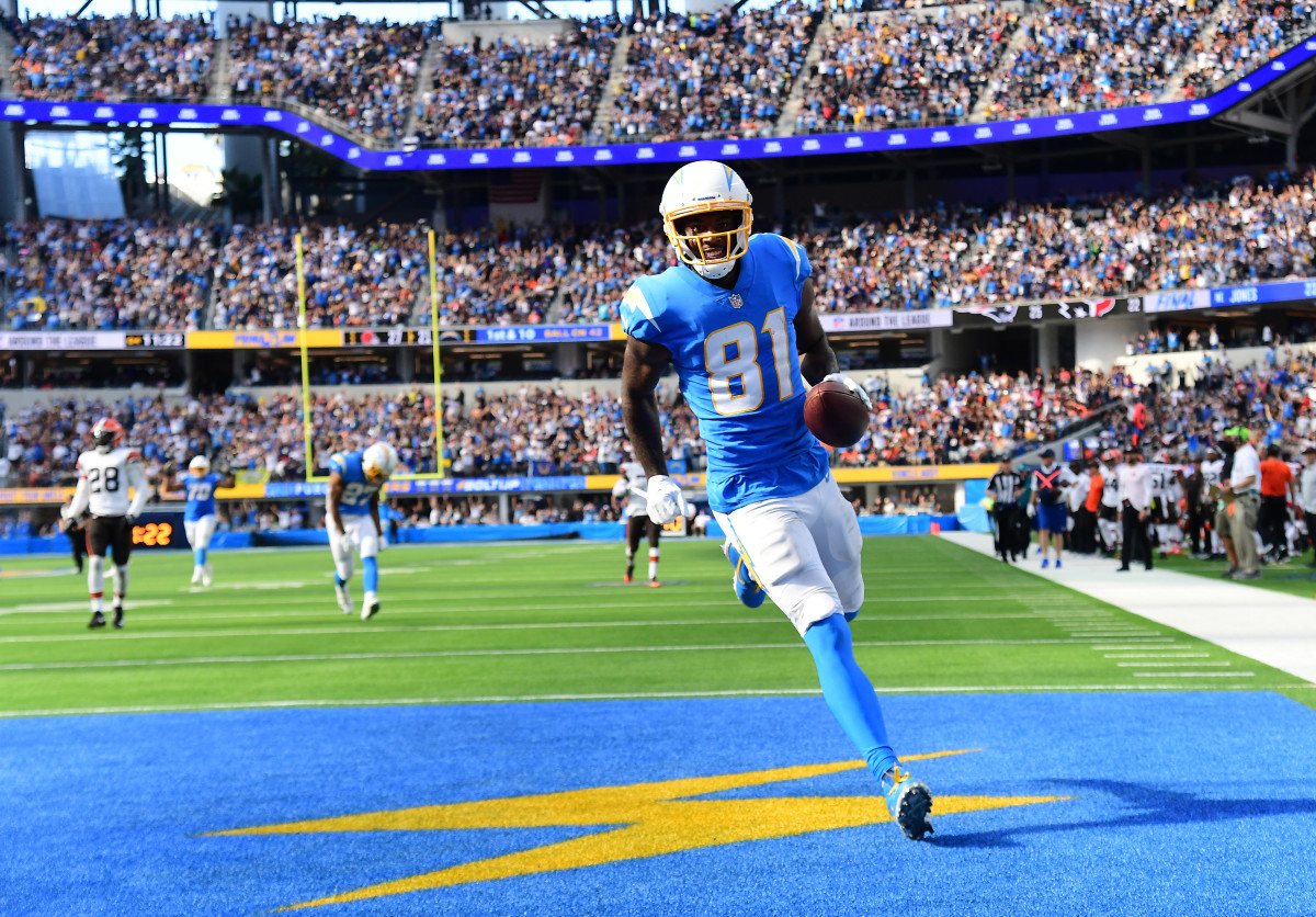 Oct 10, 2021; Inglewood, California, USA; Los Angeles Chargers wide receiver Mike Williams (81) scores a touchdown against the Cleveland Browns during the second half at SoFi Stadium. Mandatory Credit: Gary A. Vasquez-USA TODAY Sports