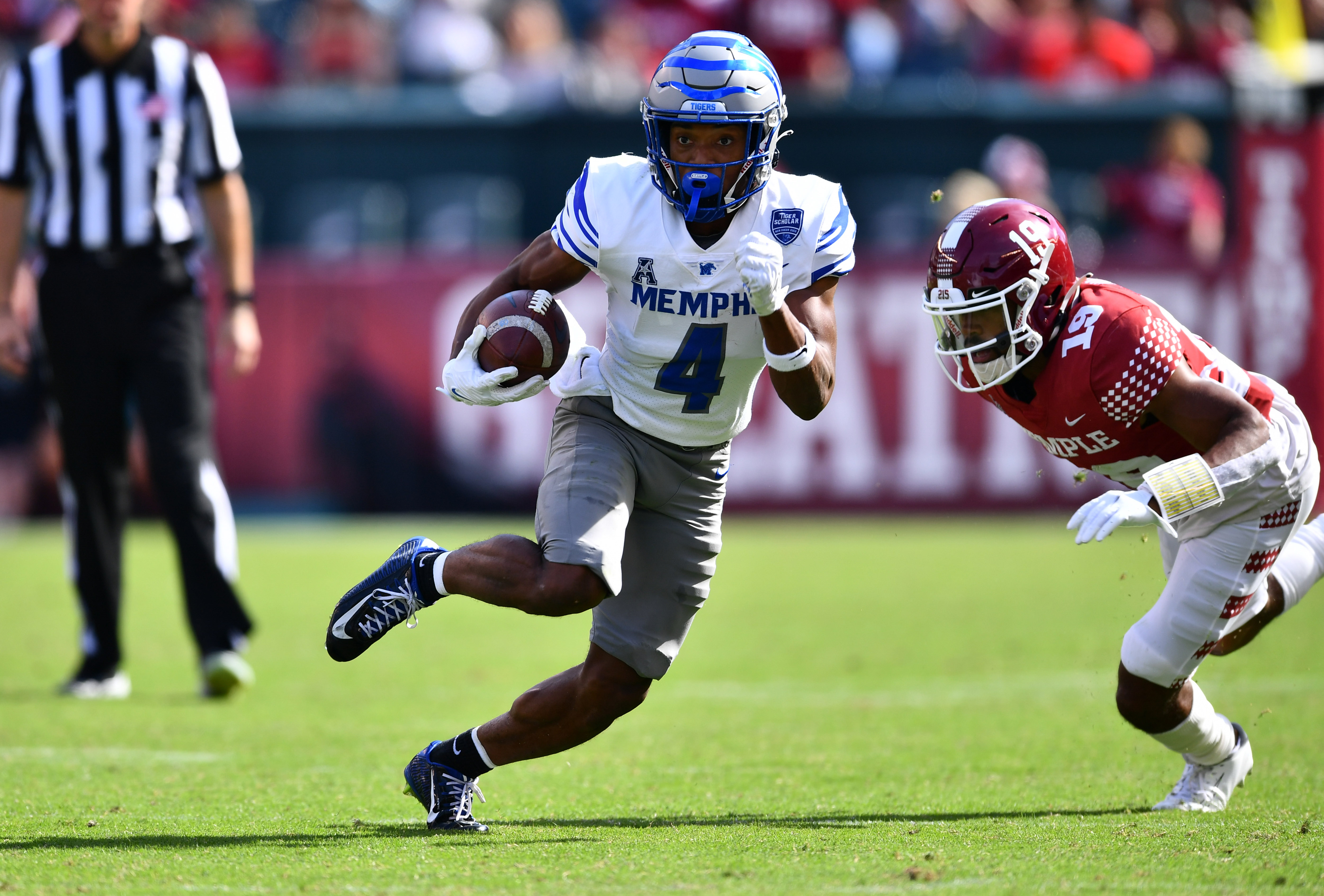 Oct 2, 2021; Philadelphia, Pennsylvania, USA; Memphis Tigers wide receiver Calvin Austin III (4) carries the ball in the second half against the Temple Owls at Lincoln Financial Field. Mandatory Credit: Kyle Ross-USA TODAY Sports