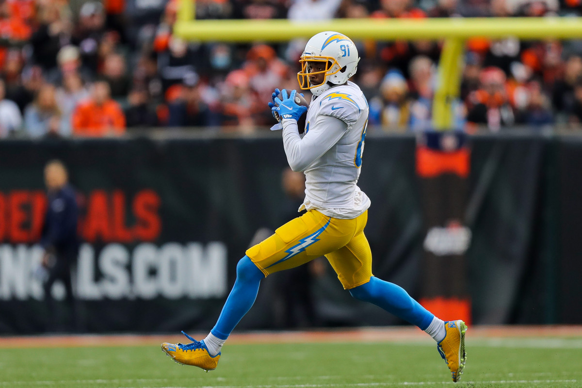 Dec 5, 2021; Cincinnati, Ohio, USA; Los Angeles Chargers wide receiver Mike Williams (81) catches a pass against the Cincinnati Bengals in the second half at Paul Brown Stadium. Mandatory Credit: Katie Stratman-USA TODAY Sports